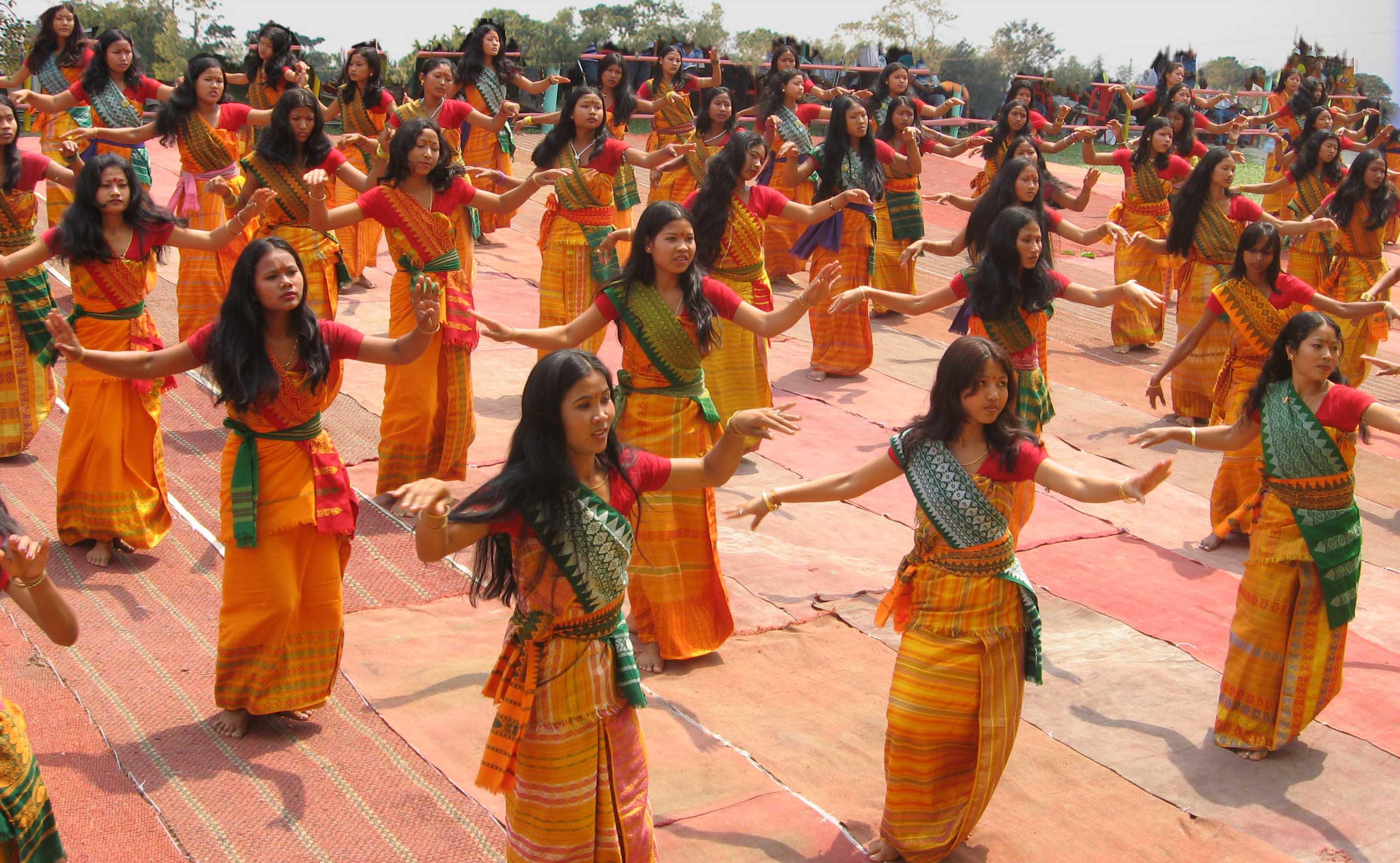Bodo dancers of Assam in traditional dokhona dress